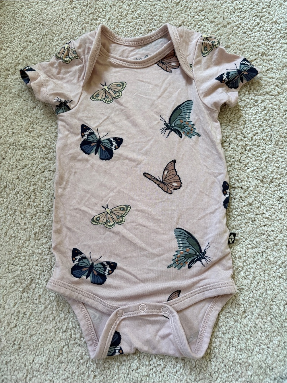 Kyte BABY Light Pink Butterfly Print One-Piece Bodysuit